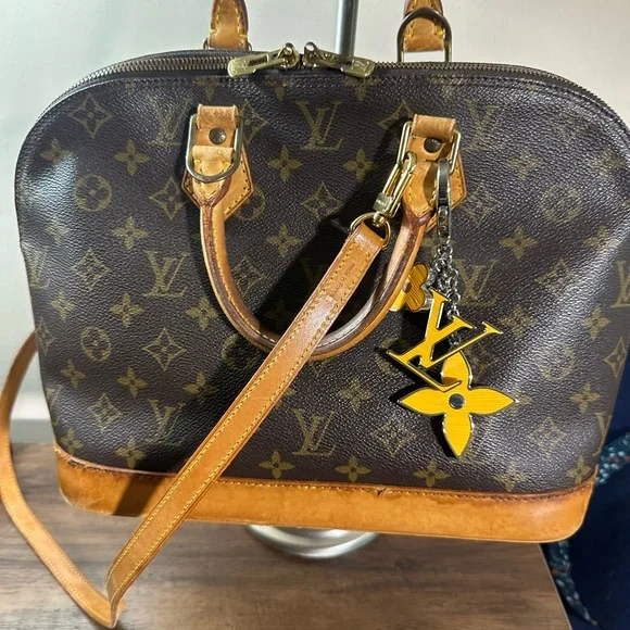 Louis Vuitton Brown and Tan Monogram with strap and keychain charm - Picture 10 of 13